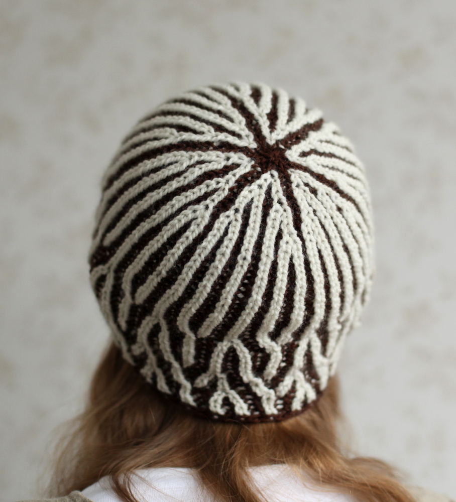 Brown and white Moreeni hat