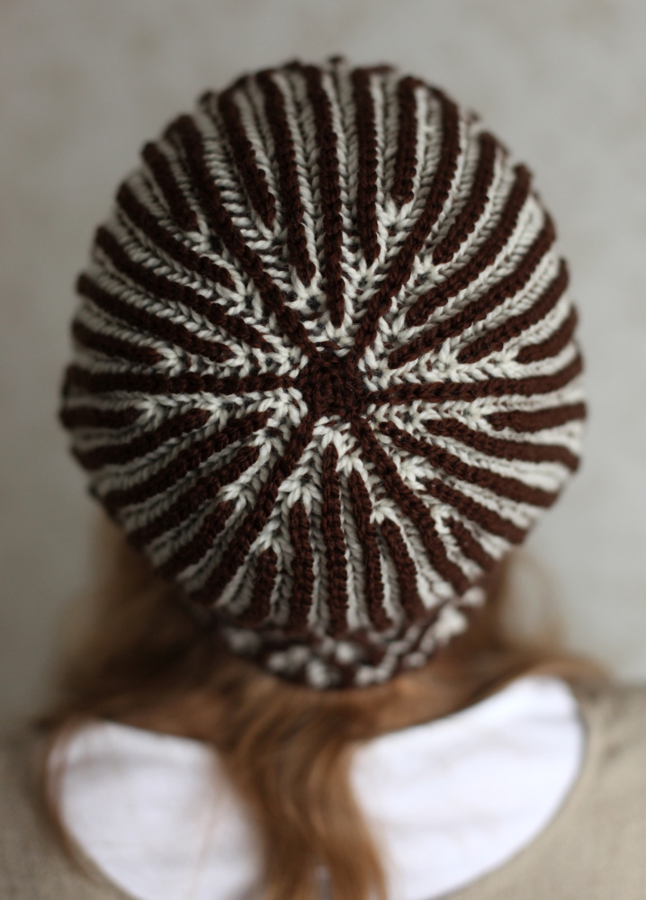 Brown and white Moreeni hat inside out